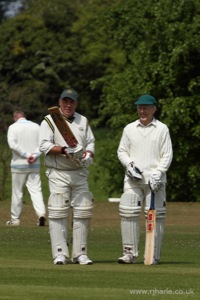 Darren Inspects His Bat