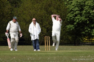 Ken Bowls as the Olivers Look On