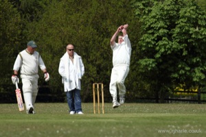 Ken Bowls as the Olivers Look On