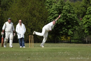 Ken Bowls as the Olivers Look On