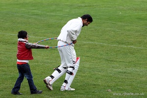 Amir and Son Playing Pony