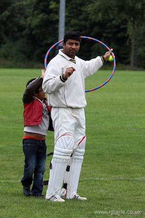 Amir and Son Playing Pony