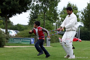 Amir and Son Playing Pony